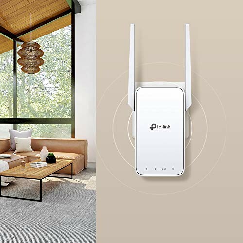 TP-Link WiFi extender on wall in modern living room